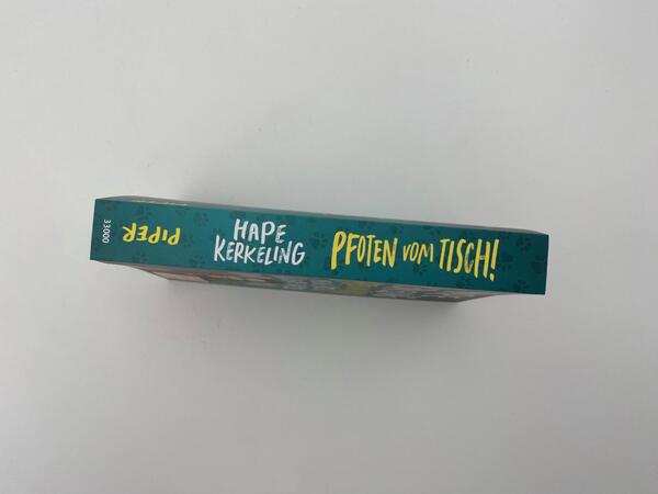 Innenansicht des Buches „Pfoten vom Tisch!“