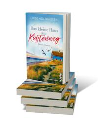 Bücherstapel des Buches „Das kleine Haus am Küstenweg“