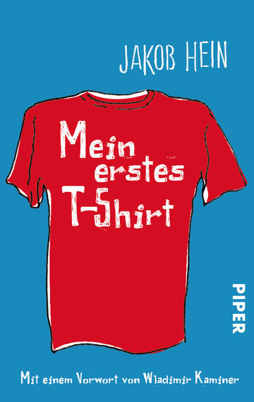 Das Buchcover zeigt einen hellblauen Hintergrund, auf dem ein rotes T-Shirt mit einem weißen Schriftzug prangt. Der Titel „Mein erstes T-Shirt“ ist in einer groben, spielerischen Schriftart gestaltet. In der oberen linken Ecke steht der Name des Autors, „Jakob Hein“, und im unteren rechten Bereich ist das Verlagslogo „PIPER“ in einer klaren, weißen Sans-Serif-Schrift abgebildet. Die gesamte Gestaltung vermittelt eine fröhliche und unbeschwerte Atmosphäre.