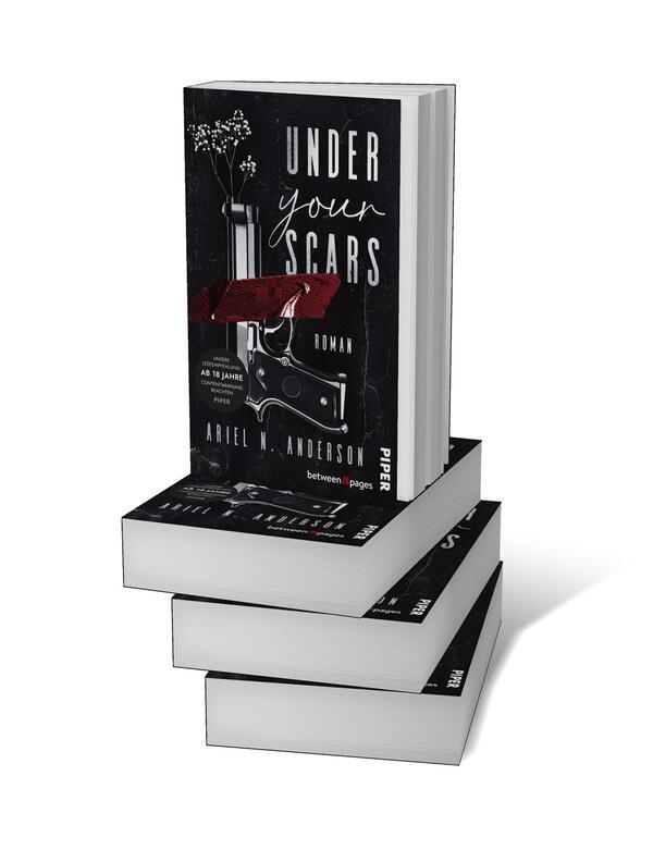 Bücherstapel des Buches „Under your Scars“