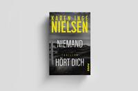Außenansicht des Buches „Niemand hört dich“