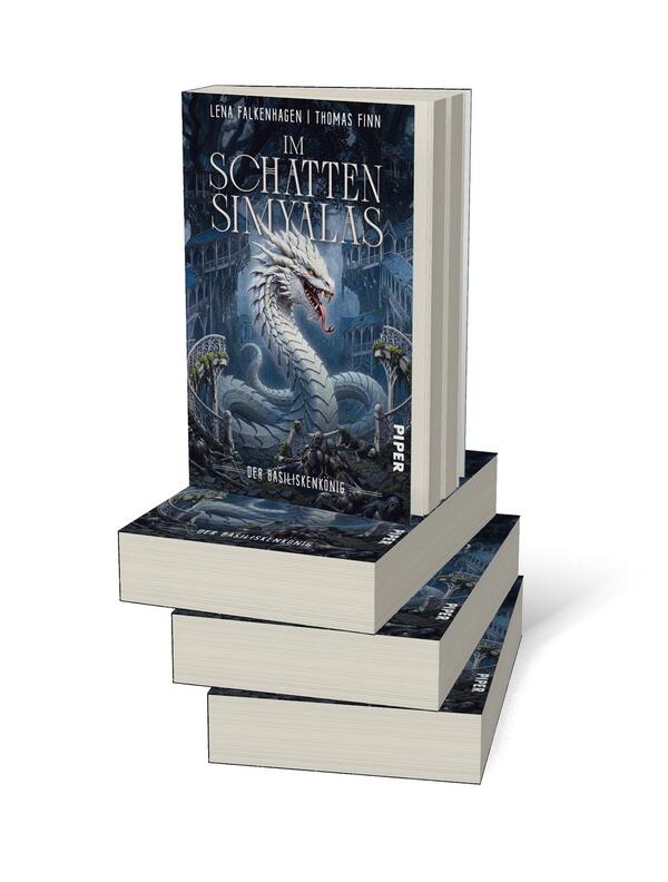 Bücherstapel des Buches „Der Basiliskenkönig“