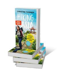 Bücherstapel des Buches „Hiking Asia“