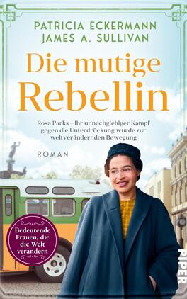 Die mutige Rebellin Das Buchcover zeigt eine stilisierte Darstellung einer Frau mit Brille, die in einem blauen Mantel gekleidet ist. Ihr Gesicht zeigt Entschlossenheit und Selbstbewusstsein. Im Hintergrund sind eine Straßenbahn und eine urbane Umgebung angedeutet. Der Titel „Die mutige Rebellin“ ist in großen, orangefarbenen Buchstaben platziert. Darunter steht in kleinerer Schrift: „Rosa Parks – Ihr unnachgiebiger Kampf gegen die Unterdrückung wurde zur weltverändernden Bewegung“. Das Cover vermittelt eine Atmosphäre von Stärke und Veränderung. In der unteren linken Ecke befindet sich ein lila Kreis mit dem Text „Bedeutende Frauen, die die Welt verändern“.
