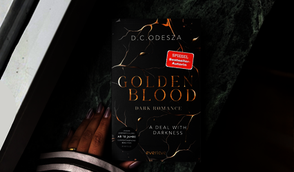 „Golden Blood – Dark Romance“ von D.C. Odesza liegt auf einem grün marmorierten Untergrund.