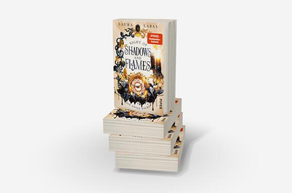 Bücherstapel des Buches „Night of Shadows and Flames – Die Ewige Nacht“
