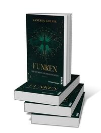 Bücherstapel des Buches „Funken – The Secrets of Dracon Rock“