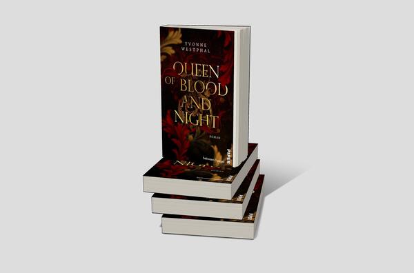 Bücherstapel des Buches „Queen of Blood and Night“