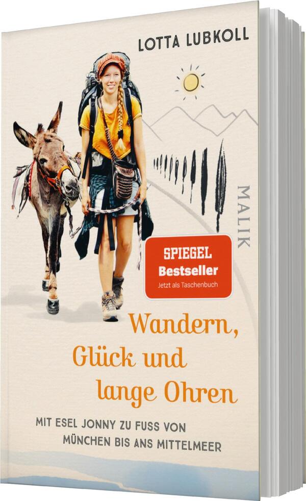 Das Buchcover zeigt eine fröhliche Wanderin mit ihrem Esel. Sie trägt einen Rucksack und ist in einer dynamischen Pose im Vordergrund abgebildet. Der Hintergrund ist hell und zeigt sanfte Berglinien und eine Sonne. Die Farben sind freundlich und warm, in Gelb- und Orangetönen. Der Titel „Wandern, Glück und lange Ohren“ ist in einer großen, verspielten Schrift gestaltet, während der Hinweis „SPIEGEL Bestseller“ in einem roten Rechteck hervorsteht. Das Verlagssymbol „MALIK“ steht am Rand in kleinerer Schrift.