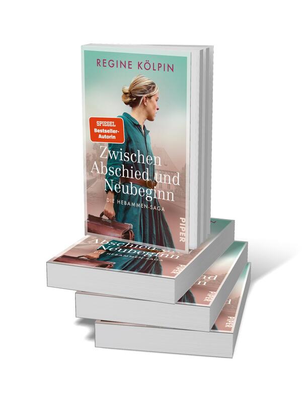 Bücherstapel des Buches „Zwischen Abschied und Neubeginn“