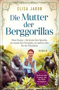 Das Buchcover zeigt eine lebendige Szene mit einer Frau, die lächelnd in einem grünen, natürlichen Umfeld steht, umgeben von zwei Berggorillas. Die Farben sind überwiegend sanfte Grüntöne, die die tropische Umgebung betonen, während die Schrift in einem klaren, eleganten Blau gehalten ist. Der Titel „Die Mutter der Berggorillas“ steht prominente oben, gefolgt von der Unterzeile über Dian Fossey. Der Autorennamen „Elisa Jakob“ befindet sich an oberster Stelle. Unten ist der Vermerk „Roman“ zu finden.