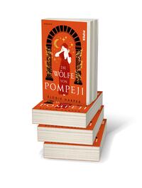 Bücherstapel des Buches „Die Wölfe von Pompeji“