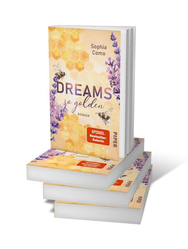 Bücherstapel des Buches „Dreams so golden“