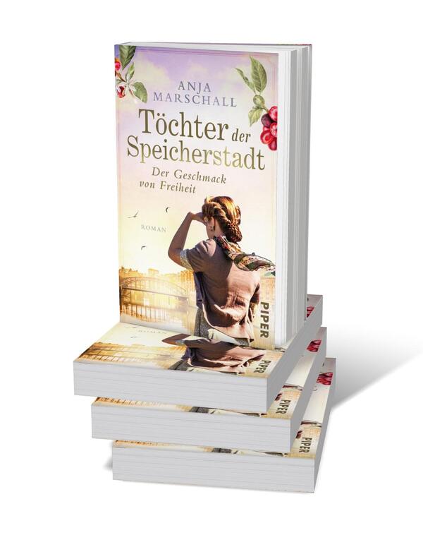 Bücherstapel des Buches „Töchter der Speicherstadt – Der Geschmack von Freiheit“