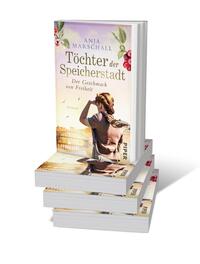 Bücherstapel des Buches „Töchter der Speicherstadt – Der Geschmack von Freiheit“
