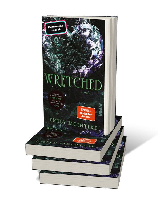 Bücherstapel des Buches „Wretched“