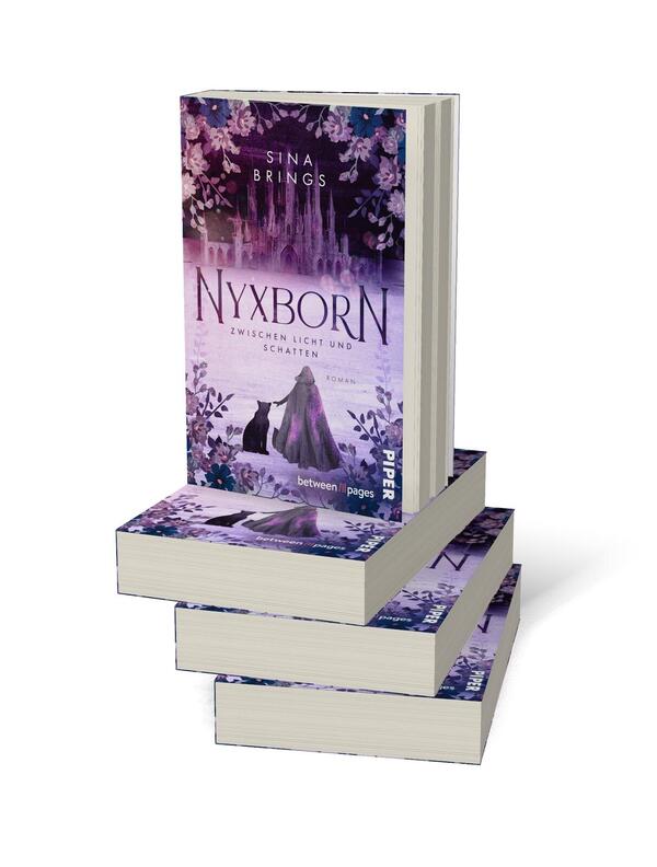 Bücherstapel des Buches „Nyxborn – Zwischen Licht und Schatten“