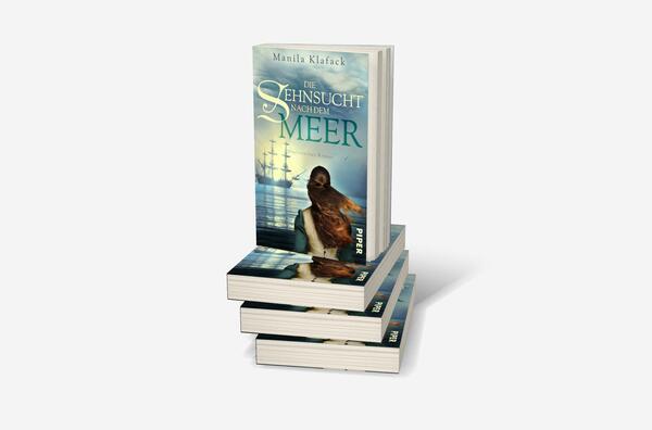 Bücherstapel des Buches „Die Sehnsucht nach dem Meer“