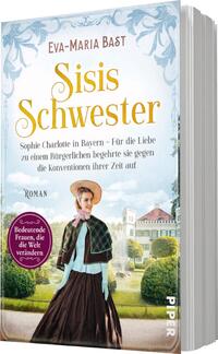 Das Buchcover zeigt eine nostalgische Szenerie mit einer historischen Frau in einem eleganten Kleid und Hut. Sie steht im Vordergrund und blickt nachdenklich in die Ferne. Im Hintergrund sind ein Schloss und Gärten angedeutet, die eine verträumte Stimmung vermitteln. Der Titel „Sisis Schwester“ ist in großen, goldenen Buchstaben platziert, darunter der Untertitel mit dem Hinweis auf die Protagonistin. Ein rundes, lila Banner auf der linken Seite trägt den Text „Bedeutende Frauen, die die Welt verändern“.