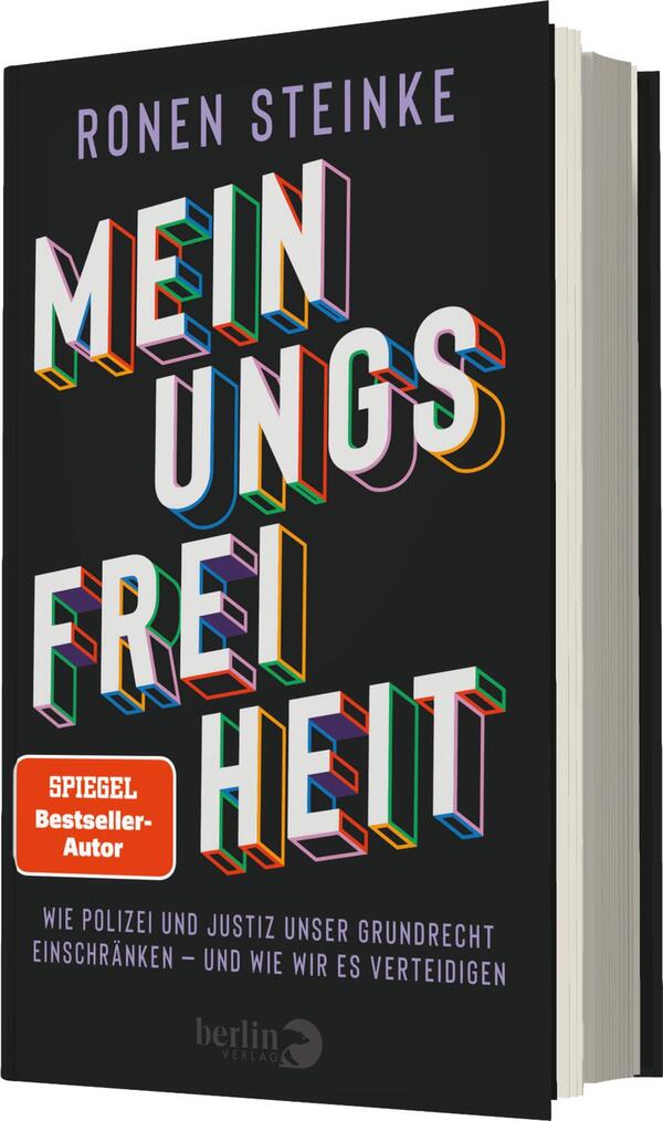 Das Buchcover zeigt einen schwarzen Hintergrund, auf dem der Titel „MEINUNGSFREIHEIT“ prominent in großen, mehrfarbigen Buchstaben dargestellt ist. Der Autor „RONEN STEINKE“ befindet sich oben in weißen Buchstaben. Ein Label in Rot mit dem Text „SPIEGEL-Bestseller-Autor“ ist in der oberen rechten Ecke platziert. Unter dem Titel steht der Untertitel, der in kleinerer Schriftgröße den Inhalt des Buches thematisiert. Die Atmosphäre des Covers wirkt kraftvoll und auffordernd.