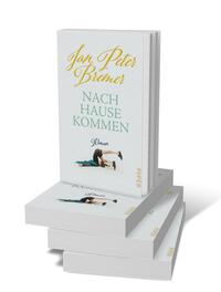 Bücherstapel des Buches „Nachhausekommen“