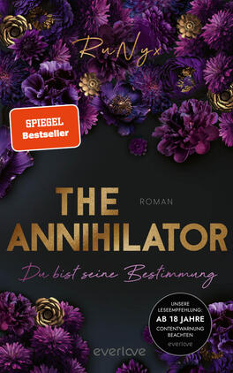 Das Buchcover zeigt einen dunklen Hintergrund, der mit üppigen, lila blühenden Blumen und goldenen Akzenten dekoriert ist. In der Mitte steht der Titel „THE ANNIHILATOR“ in großen, fettgedruckten Buchstaben, darunter der Zusatz „ROMAN“ in kleinerer Schrift. Darunter findet sich der Untertitel „Du bist seine Bestimmung“ in eleganter, handschriftlicher Typografie. Oben links befindet sich ein rotes Label mit „SPIEGEL Bestseller-Autorin“.