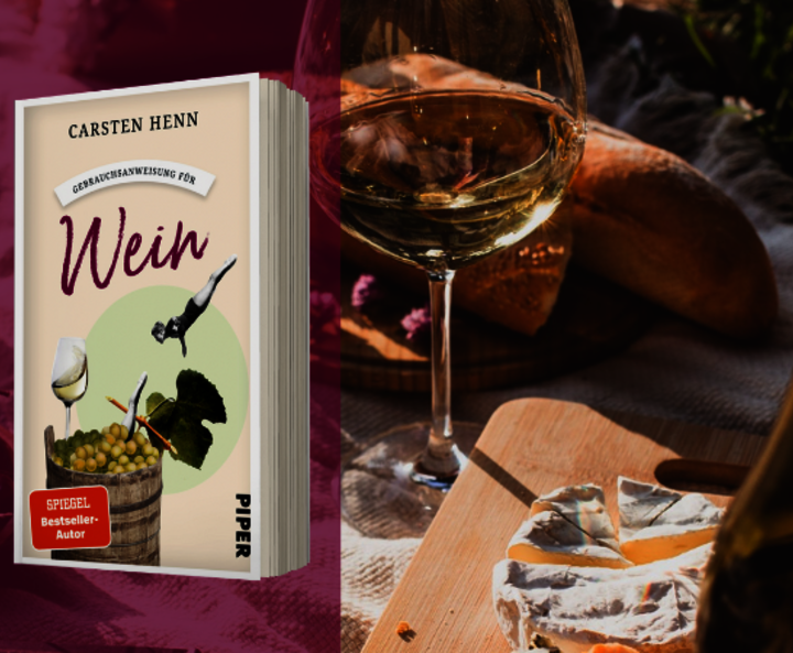 Buch mit Wein-Picknick im Hintergrund