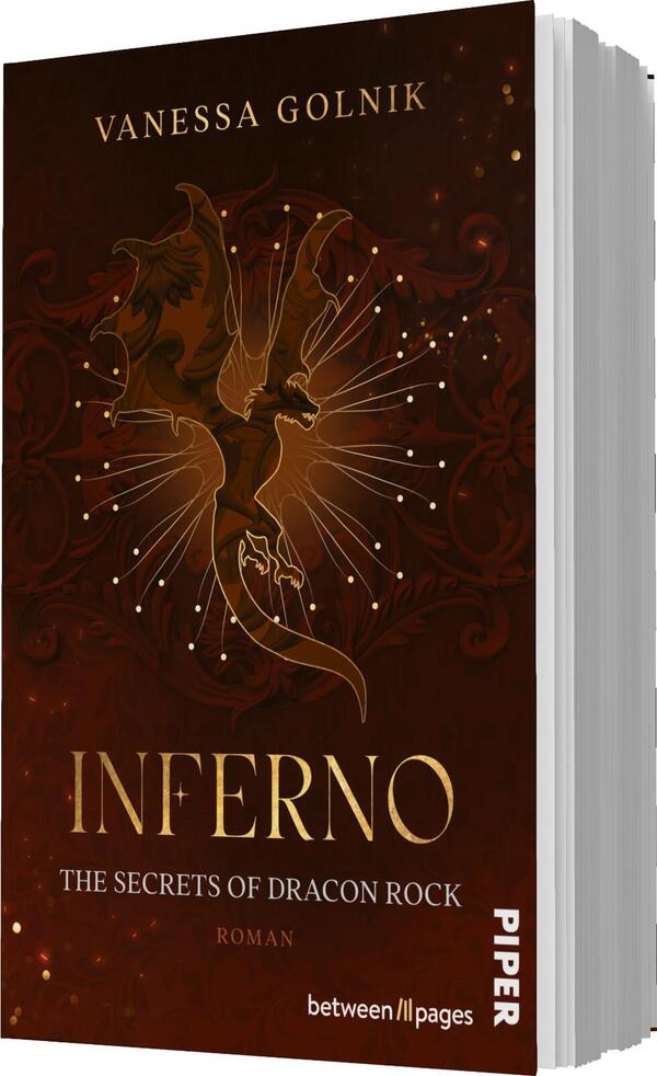 Das Buchcover zeigt einen dunklen, rotbraunen Hintergrund, auf dem ein goldglänzender Drache stilisiert dargestellt ist, umgeben von strahlenden Punkten. Der Titel „INFERNO“ ist in großen, eleganten Buchstaben in Gold gehalten und hebt sich deutlich ab. Darunter steht „THE SECRETS OF DRACON ROCK“ in kleinerer, weißer Schrift. Der Name der Autorin, Vanessa Golnik, befindet sich oben auf dem Cover. Die Gesamtatmosphäre vermittelt ein Gefühl von Geheimnis und Abenteuer.