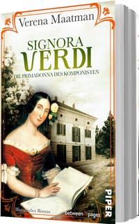 Das Buchcover zeigt eine historische, nostalgische Szene: oben der Autorenname Verena Maatman in schlichter Serifenschrift, darunter der Titel „SIGNORA VERDI“ in großen grünen Versalien, gefolgt von der Unterzeile „Die Primadonna des Komponisten“ in kleinerer Serifenschrift. Im Vordergrund eine rot gekleidete Frau mit dunklem Haar und weißer Blüte, die ein geöffnetes Notenbuch hält; im Hintergrund ein klassizistisches Landhaus, creme-, olivgrüne und orange Akzente.