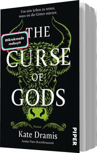 Das Buchcover zeigt einen dunklen Hintergrund mit einem großen, stylisierten Wolfsgesicht in kräftigen Grüntönen. Der Titel „THE CURSE OF GODS“ ist prominent in weißer, eleganter Typografie platziert. Oben steht der Satz „Um sein Leben zu retten, muss sie die Götter stürzen.“ In der unteren Ecke findet sich der Autorennamen Kate Dramis sowie der Hinweis „Roman“. Ein runder, heller Badge enthält den Text „Vorläufiges Cover“. Ein weiteres farbiges Banner mit der Aufschrift „#itokmade mebuyit“ ist ebenfalls vorhanden.