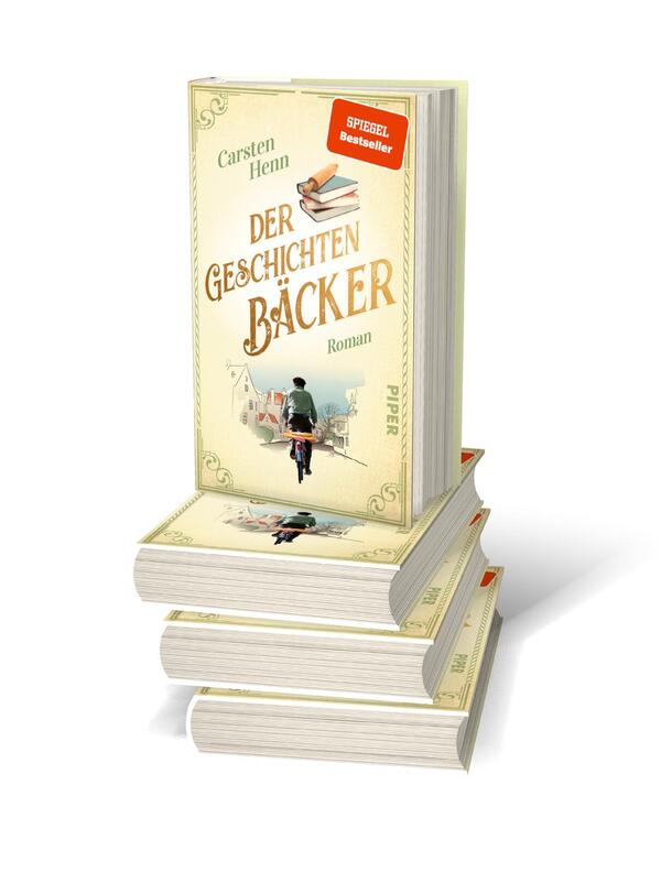Bücherstapel des Buches „Der Geschichtenbäcker“