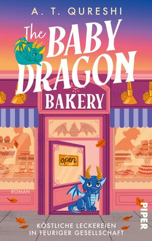 Das Buchcover zeigt einen pastellwarmen Sonnenuntergangsverlauf über einer rosafarbenen Bäckerei mit blauen Markisen, ausgestellten Torten und einem Eingangsschild „open“. Vor der Tür sitzt ein blau-türkisfarbener Babydrache mit gelben Hörnern; oben links ist ein kleiner grüner Drache. Titelgestaltung: verspielte große weiße Serifenschrift für „BABY DRAGON“, kursive „the“ und „BAKERY“ auf einem Schild. Autor: A. T. Qureshi. Atmosphäre: gemütlich und einladend.
