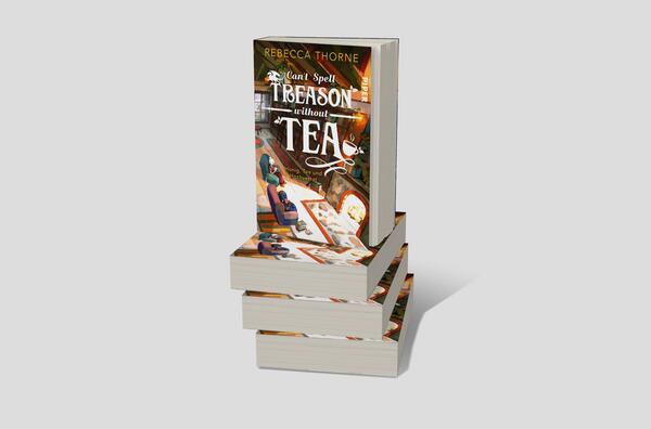 Bücherstapel des Buches „Can’t Spell Treason Without Tea“