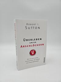 Innenansicht des Buches „Überleben unter Arschlöchern“