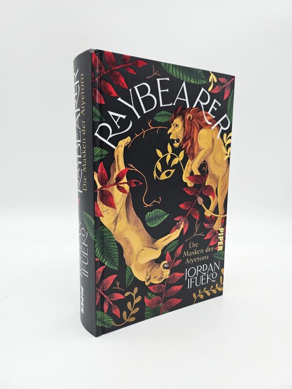 Innenansicht des Buches „Raybearer – Die Masken der Aiyetoro“