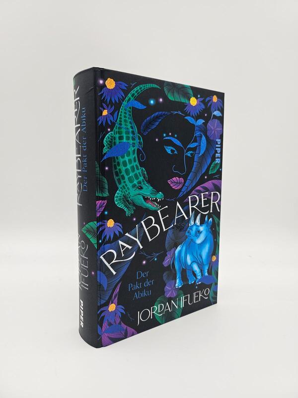 Außenansicht des Buches „Raybearer – Der Pakt der Abiku“