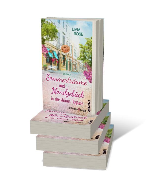 Bücherstapel des Buches „Sommerträume und Mondgebäck in der kleinen Teestube“